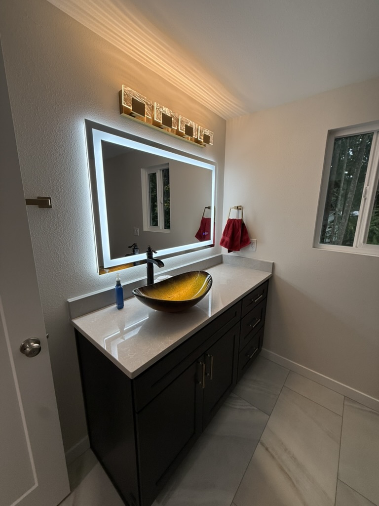 Vessel sink and illuminated mirror