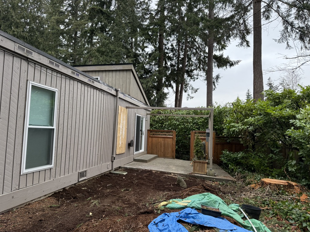 During repairs — exterior wall, windows, and siding