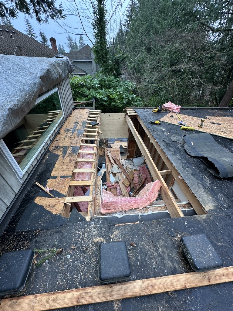 During repairs — exposed roof framing and reconstruction